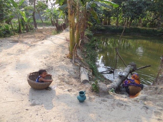 Child placed in basket by its mother